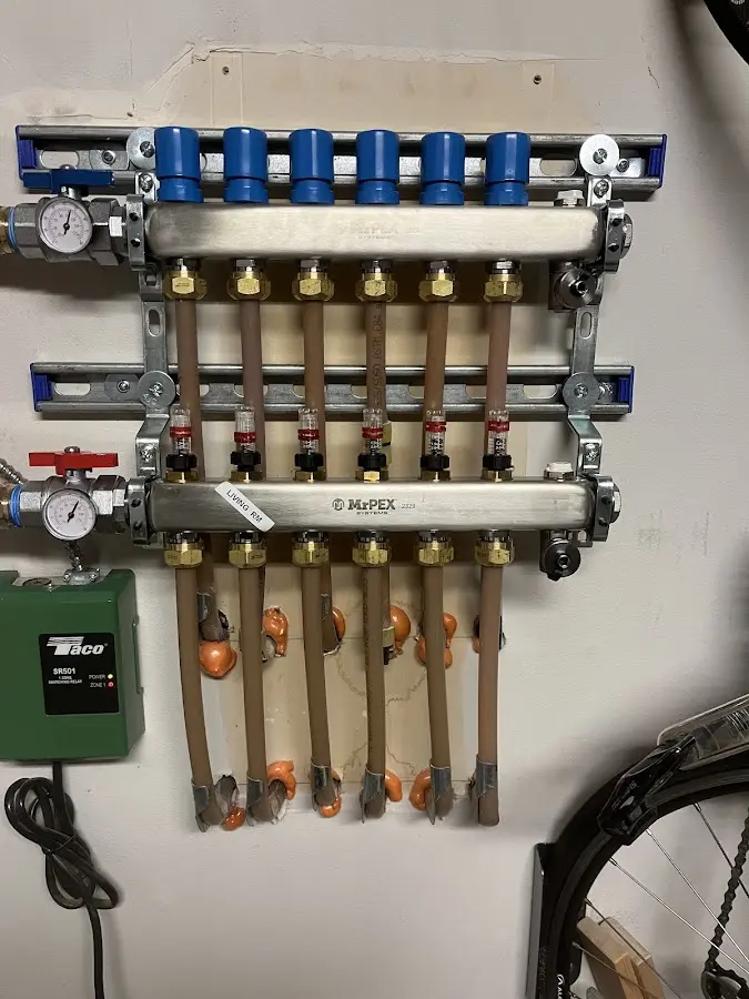 Plumber performing Leak Detection at a residential property in West Burlington